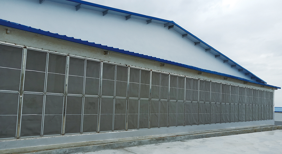 大型猪舍外侧挡沙网过滤墙。